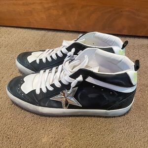 Golden Goose Black and White Sneakers with Silver Star